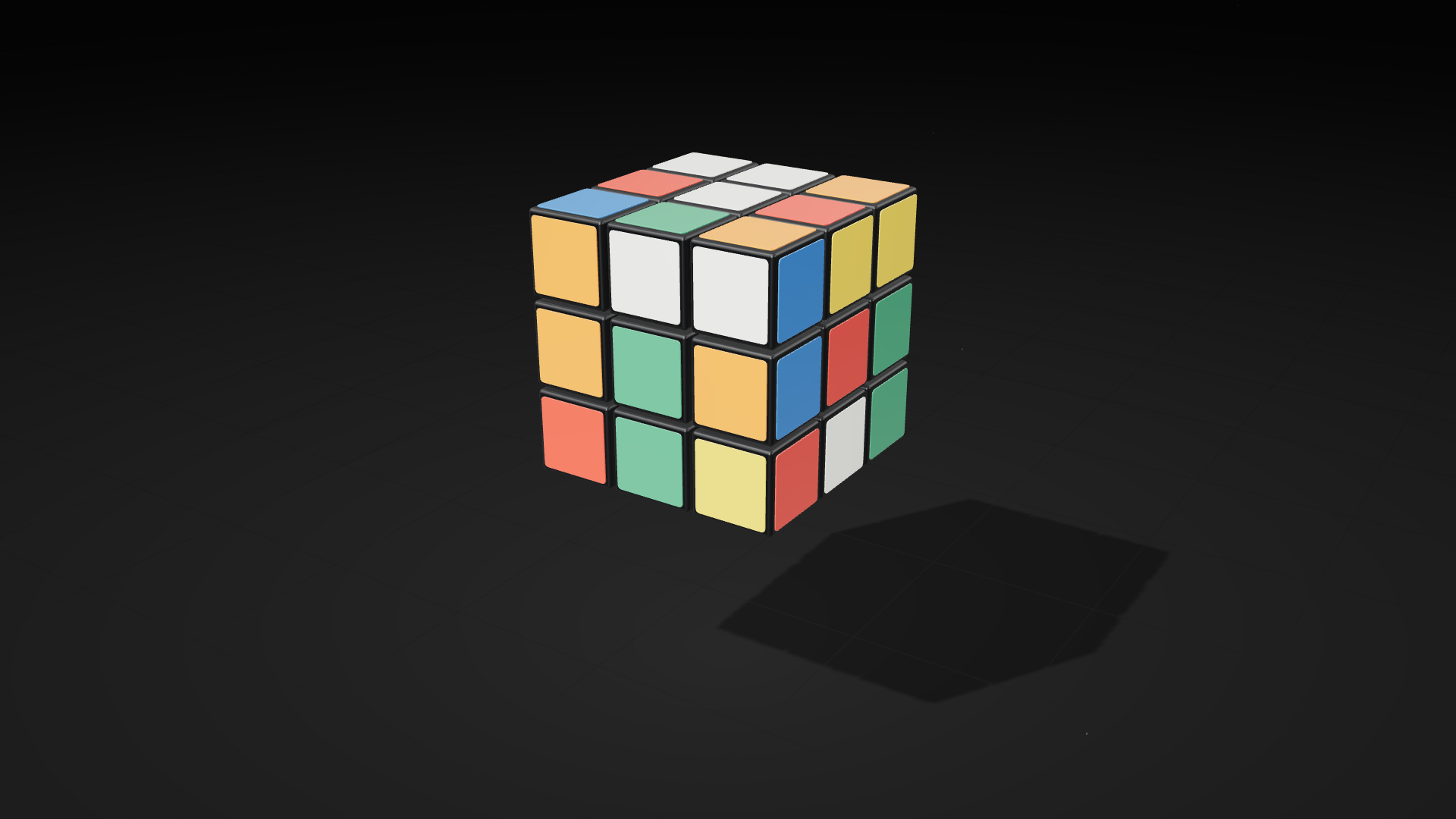 A scrambled three-by-three twisty cube with six glossy colored faces and a dark frame.